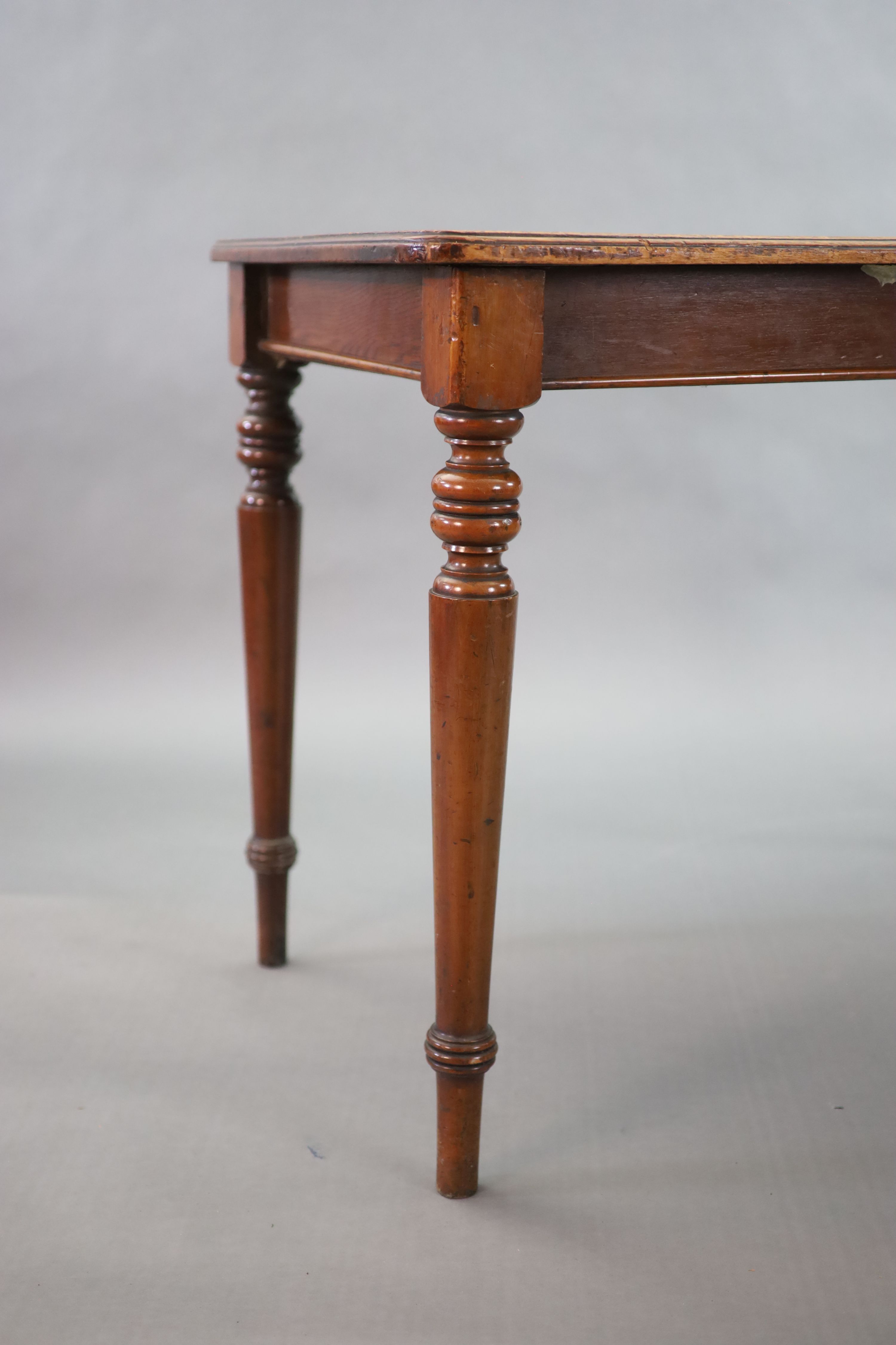 A pair of late Victorian mahogany writing tables, W.112cm D.68cm H.77.5cm